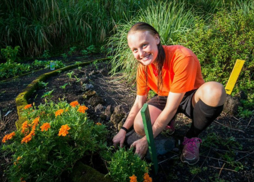 smiling young adult student; outdoor behavioral health programs